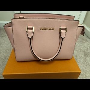 Michael Kors pale pink handbag with strap